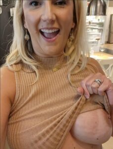 Flashing a boob while out shopping