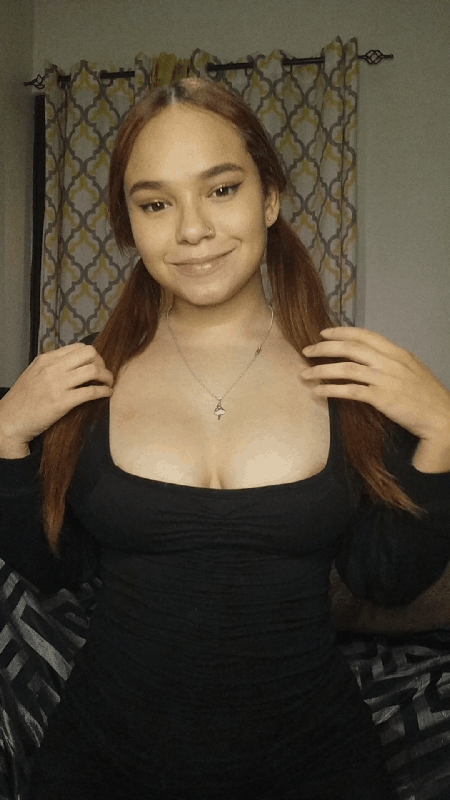 White tits with a small pink dot in the middle