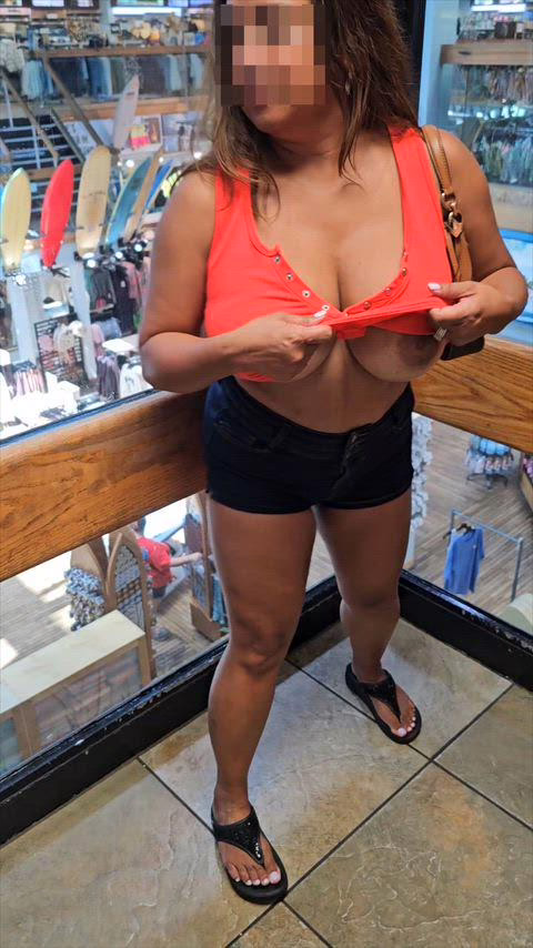 Flashing my 36G titties inside the surf shop
